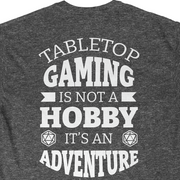 Cat20Designs tabletop gaming is not a hobby it's an adventures, back of shirt design, Close up of Tabletop Roleplaying Game nerdy and geeky tshirt apparel design, merch for fantasy ttrpgs like dungeons and dragons and pathfinder, perfect gift for dungeon master or game masters