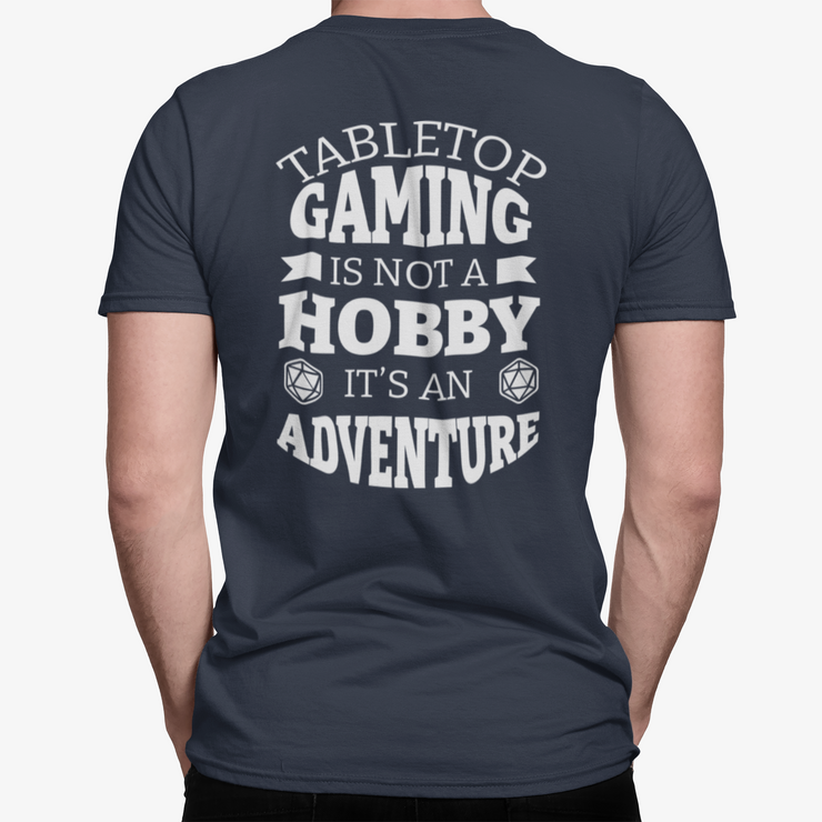 Cat20Designs tabletop gaming is not a hobby it's an adventures, back of shirt design, person wearing a Tabletop Roleplaying Game nerdy and geeky tshirt apparel design, merch for fantasy ttrpgs like dungeons and dragons and pathfinder, perfect gift for dungeon master or game masters