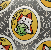 Cat20Designs Fantasy tabletop roleplaying game inspired sticker, hand drawn, original design, dungeons and dragons and pathfinder sticker of Cat20Designs Logo and mascot Brian, The Hero of The Adventure of Brian, and the face of the #BrianNFT